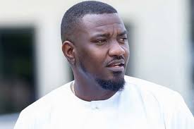 John Dumelo trolled for holding waist of UG student